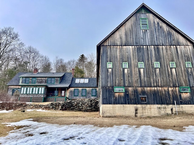 view of snow covered house