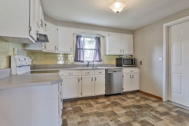 kitchen with a sink, decorative backsplash, extractor fan, appliances with stainless steel finishes, and white cabinetry