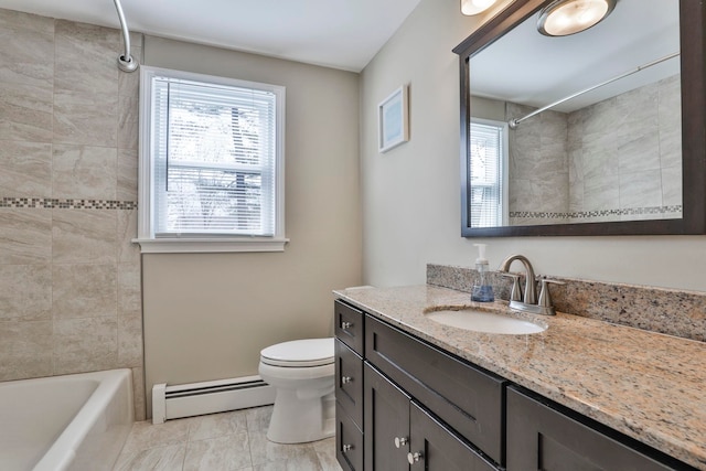 bathroom with a baseboard heating unit, toilet, vanity, and shower / washtub combination