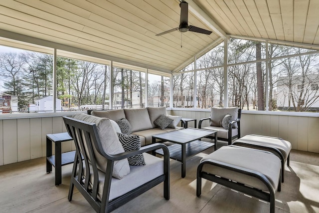 sunroom / solarium featuring lofted ceiling with beams, a healthy amount of sunlight, ceiling fan, and wood ceiling