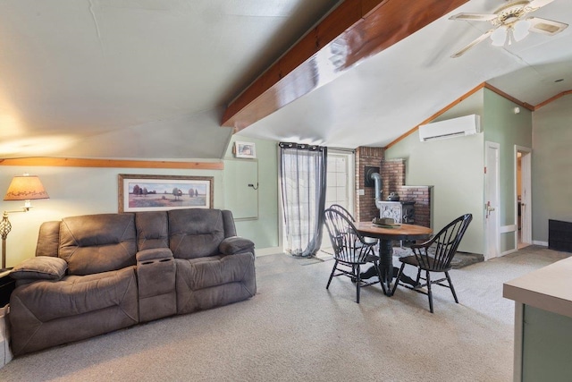 living room featuring vaulted ceiling with beams, ceiling fan, carpet floors, a wood stove, and a wall mounted AC