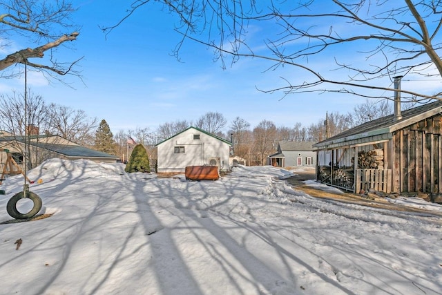 view of yard covered in snow