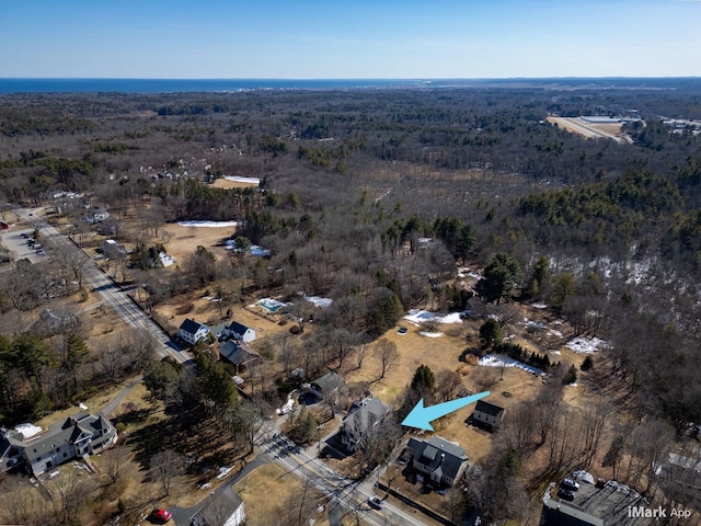 bird's eye view featuring a forest view