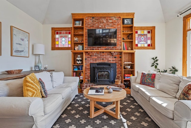 living room featuring lofted ceiling