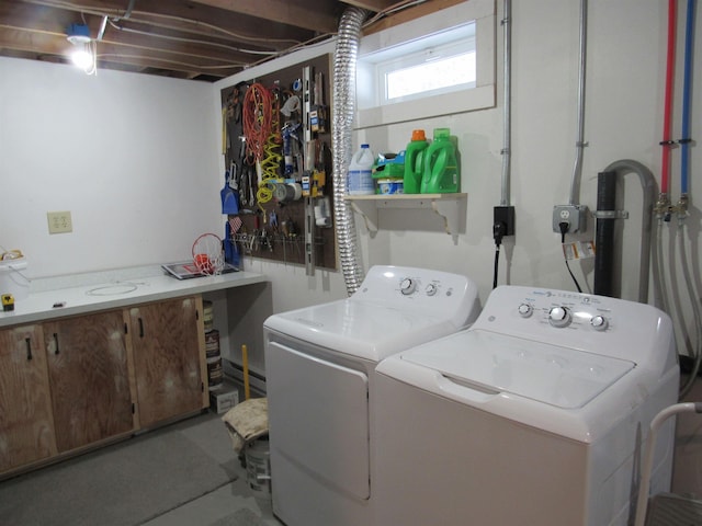 washroom with laundry area and washing machine and clothes dryer