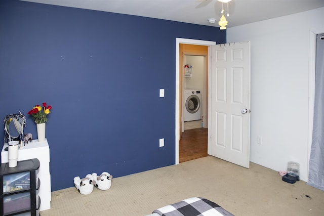 bedroom with washer / clothes dryer