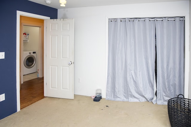 bedroom featuring washer / clothes dryer