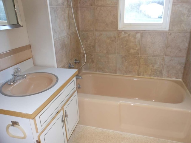 full bath featuring vanity and shower / bathing tub combination