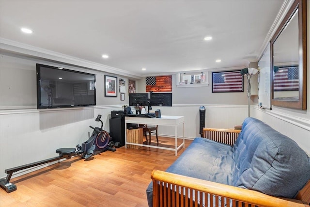 office with recessed lighting, wood finished floors, a wainscoted wall, and ornamental molding