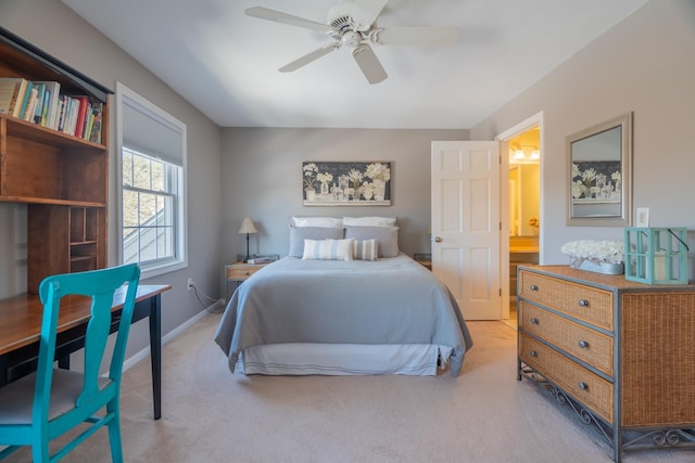 bedroom with a ceiling fan, baseboards, and light carpet