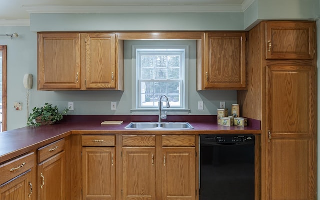 kitchen with dark countertops, crown molding, dishwasher, brown cabinetry, and a sink