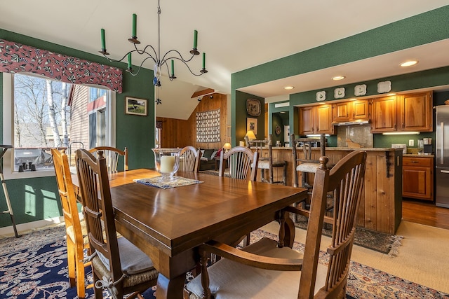 dining space featuring recessed lighting