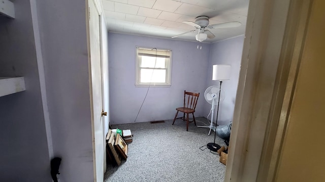 bedroom with ceiling fan, carpet, and ornamental molding