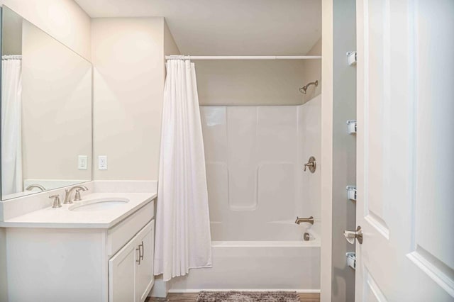 full bathroom featuring vanity and shower / bath combo