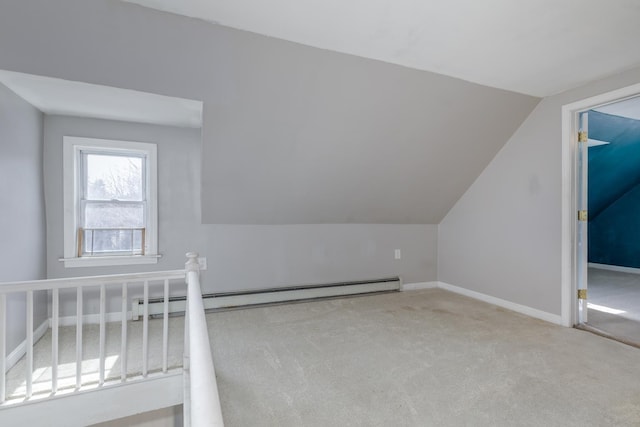 bonus room featuring carpet flooring, baseboards, lofted ceiling, and a baseboard radiator