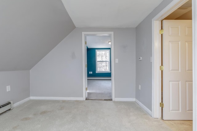 bonus room with baseboards, light colored carpet, lofted ceiling, baseboard heating, and a baseboard radiator