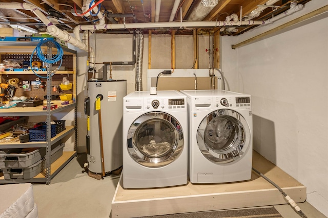 laundry room with water heater, laundry area, and independent washer and dryer