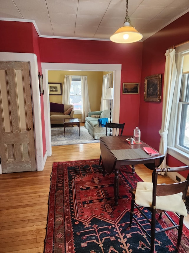 dining space with light wood-style flooring