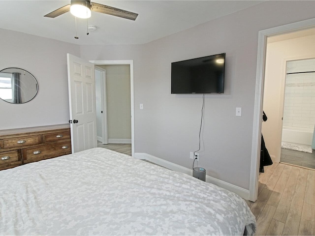 bedroom featuring ceiling fan, baseboards, and wood finished floors