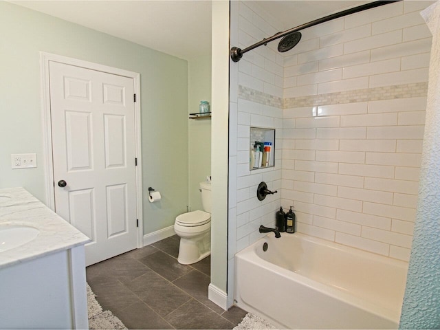 bathroom featuring vanity, shower / tub combination, toilet, and baseboards