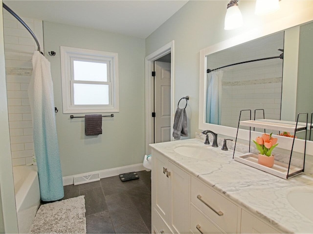 bathroom with visible vents, baseboards, double vanity, a sink, and shower / tub combo with curtain