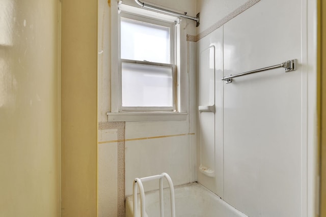 full bathroom featuring a tub to relax in and walk in shower