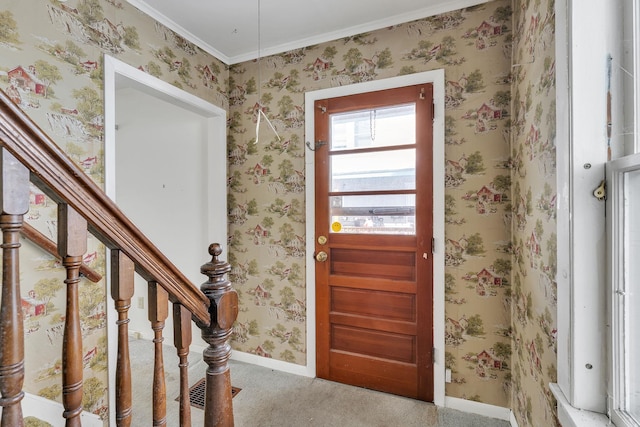 foyer featuring wallpapered walls, stairs, baseboards, and carpet floors