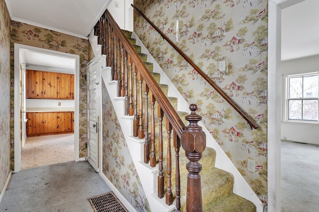 stairs featuring visible vents, baseboards, carpet flooring, and wallpapered walls