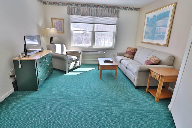 carpeted living area featuring baseboards and a wall mounted AC