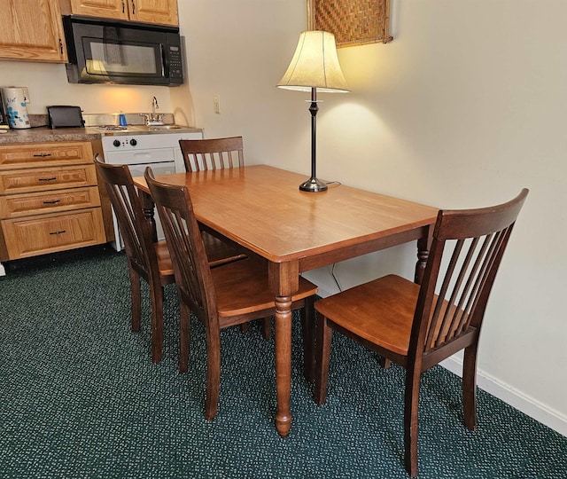 dining space with baseboards