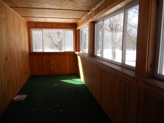 sunroom with wood ceiling