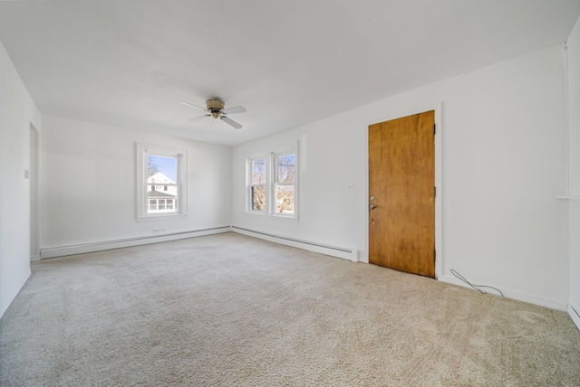 unfurnished room featuring ceiling fan and carpet flooring