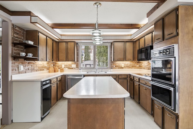 kitchen with beam ceiling, a sink, decorative backsplash, black appliances, and a center island