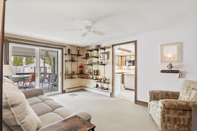 living room featuring light colored carpet, a textured ceiling, ceiling fan, and a baseboard radiator