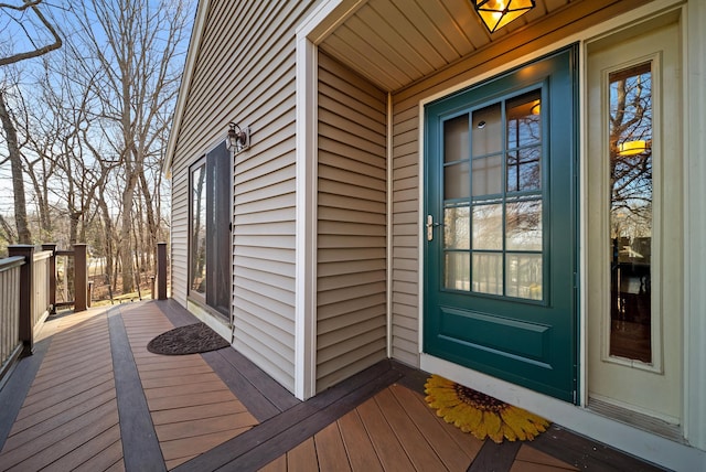 doorway to property featuring a wooden deck