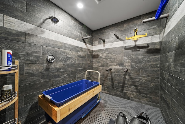 bathroom with tiled shower