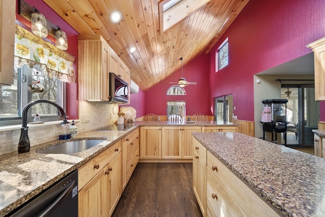 kitchen with a peninsula, a sink, light brown cabinetry, dishwasher, and wooden ceiling