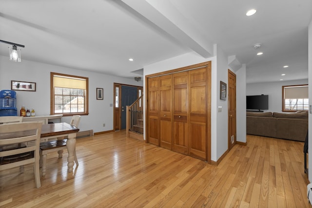 dining area featuring recessed lighting, light wood-type flooring, and a wealth of natural light