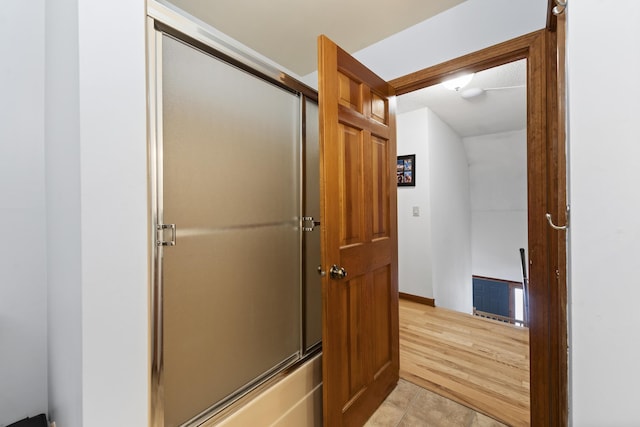 full bathroom with wood finished floors