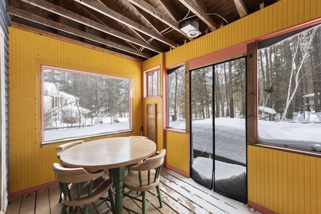 sunroom / solarium with beamed ceiling