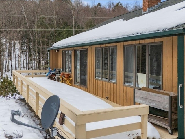 view of snow covered deck