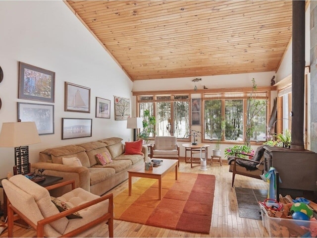 living room with high vaulted ceiling, wood ceiling, and light wood-style floors