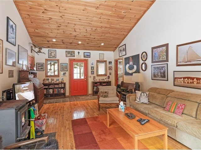 living room with high vaulted ceiling, wood ceiling, and hardwood / wood-style floors