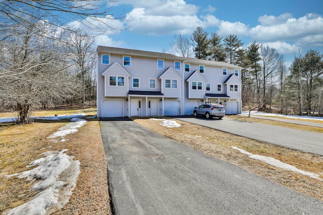 view of front of home featuring a garage and driveway