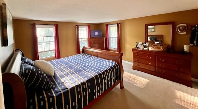 bedroom featuring carpet flooring