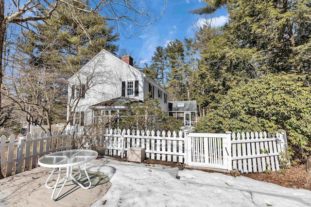 exterior space with a fenced front yard