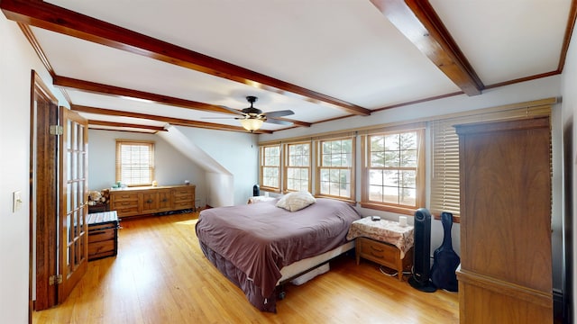 bedroom featuring light wood-type flooring, beamed ceiling, and a ceiling fan