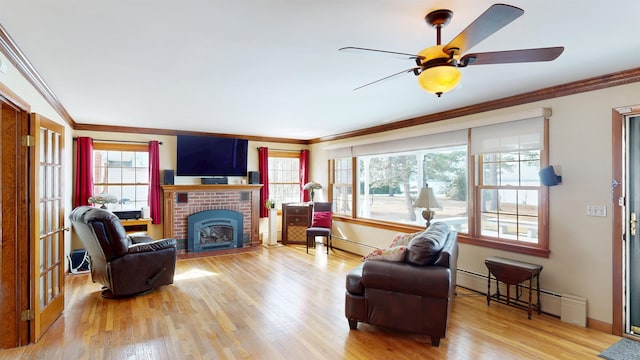 living area featuring a fireplace, wood finished floors, and ornamental molding