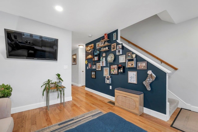 interior space featuring visible vents, recessed lighting, baseboards, and wood finished floors