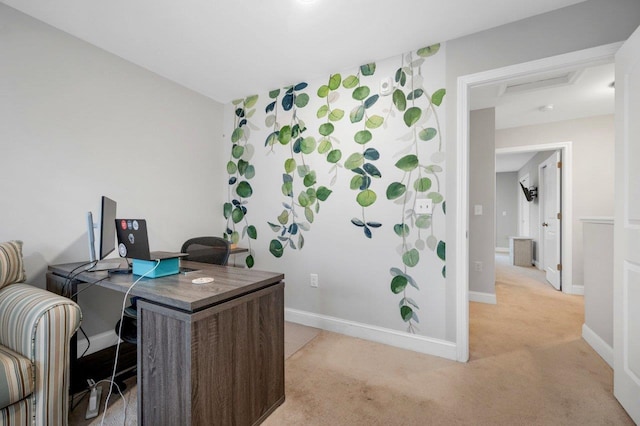 home office with light colored carpet and baseboards